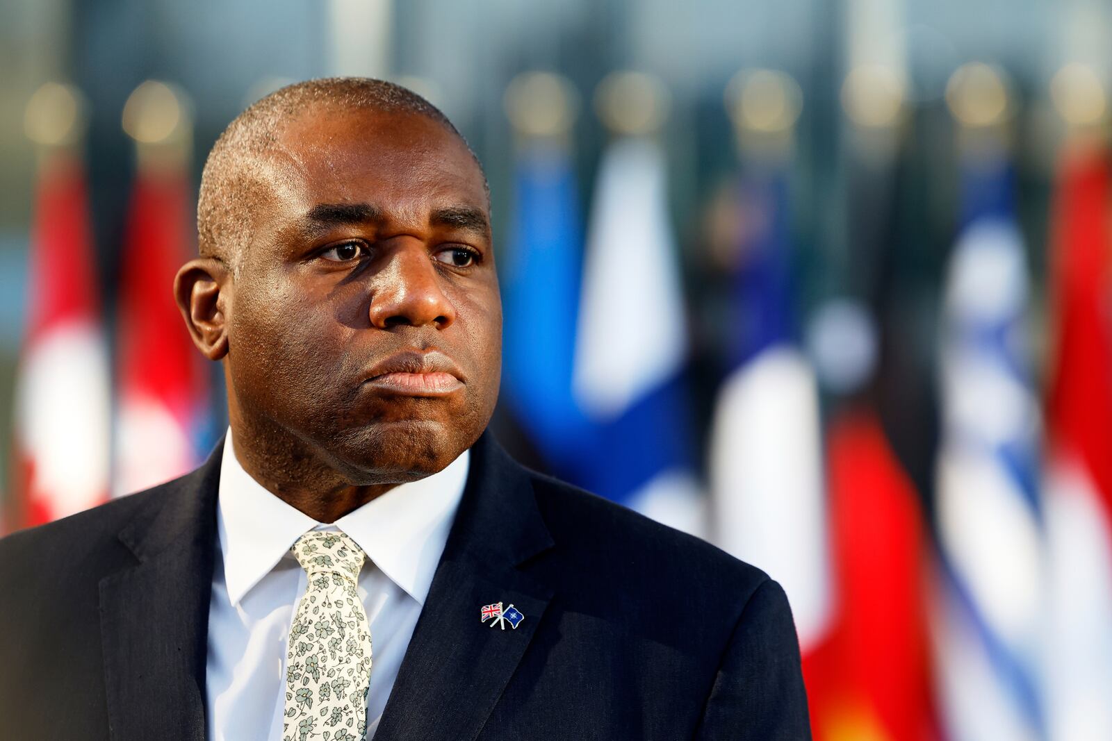 Britain's Foreign Secretary David Lammy addresses the media during a meeting of NATO foreign ministers at NATO headquarters in Brussels, Friday, April 4, 2025. (AP Photo/Geert Vanden Wijngaert)