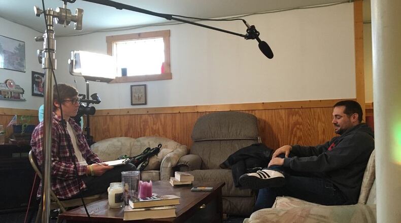Tom Cook conducts and interview in his role of production manager for “Epicenter: Dayton s Opioid Crisis” a documentary created by University of Dayton students.