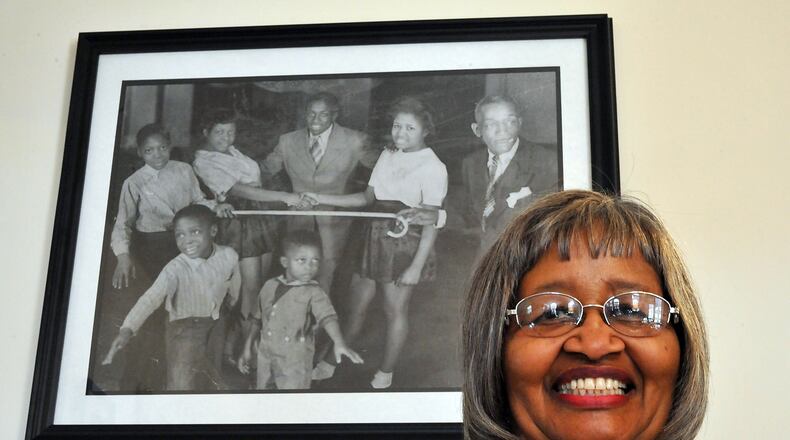 Anna Clara Gee Blackwell grew up in a musical family, shown in the background, in which her father taught tap dancing lessons and her mother filled the kitchen rest of the home with the sounds of spirituals. Staff photo by Bill Lackey