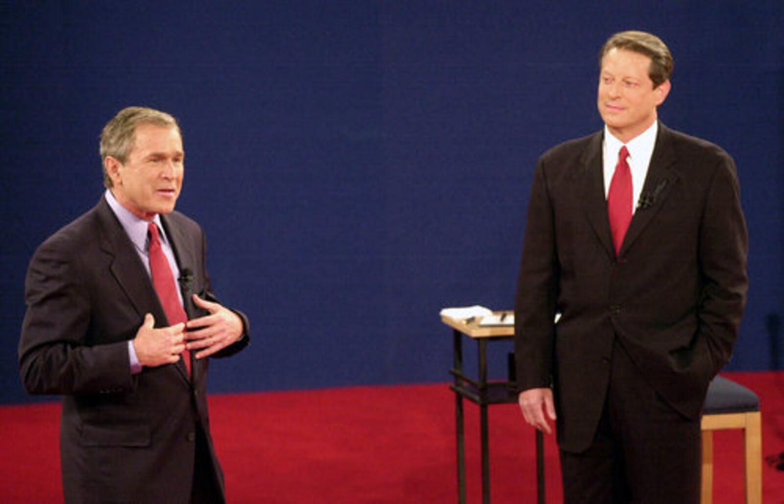 Republican presidential candidate Texas Gov. George W. Bush, left, speaks as Democratic presidential candidate Vice President Al Gore watches during their debate at Washington University in this St. Louis file photo from Oct. 17, 2000.