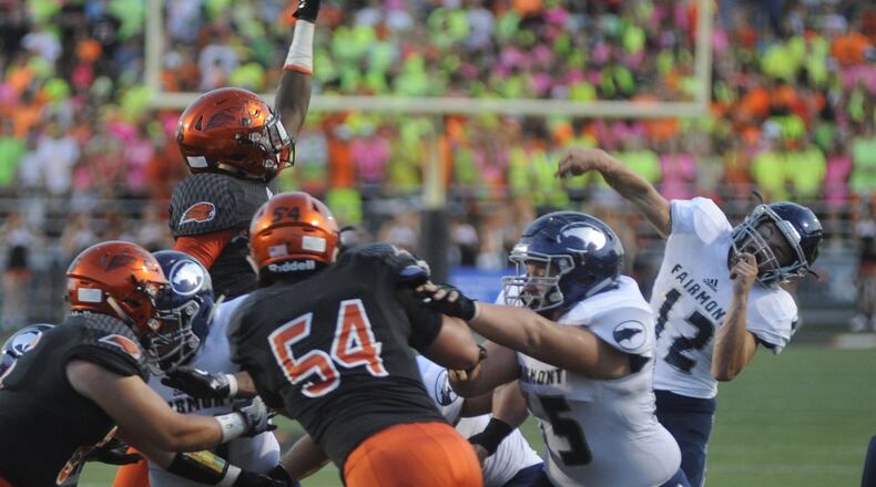 Fairmont QB Braden Miller unloads. Beavercreek defeated visiting Fairmont 14-3 in a GWOC National East high school football opener on Friday, Sept. 22, 2017. MARC PENDLETON / STAFF