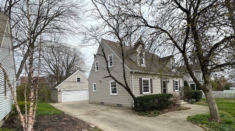 This vinyl sided cape cod style home was originally built in 1941 but has been completely updated. It has a two plus car detached garage and fenced in back yard.
