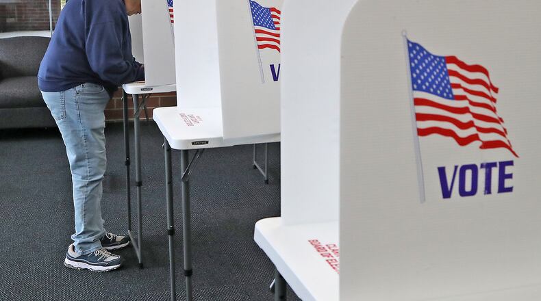 FILE PHOTO: Voters cast their votes at a Springfield election poll Tuesday, May 3, 2022. BILL LACKEY/STAFF
