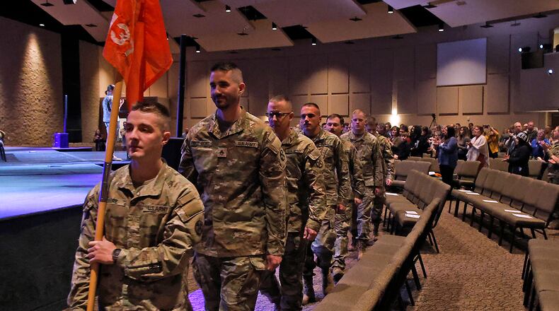 Members of the Ohio Army National Guard's 1137th Signal Company participated is a Call to Duy Ceremony Friday, Feb. 12, 2024 at the First Christian Church. The company is being deployed for nine months is support of U.S. Central Command. BILL LACKEY/STAFF