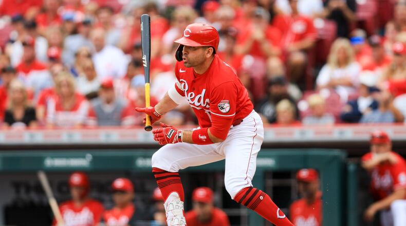 Cincinnati Reds' Joey Votto watches his RBI-single during the sixth inning of a baseball game against the Baltimore Orioles in Cincinnati, Sunday, July 31, 2022. (AP Photo/Aaron Doster)