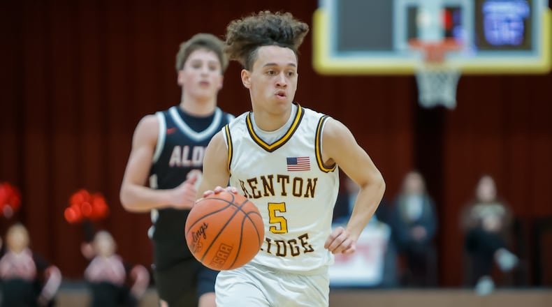 Kenton Ridge High School senior Xavier White dribbles the ball up the floor during their game against Jonathan Alder on Friday, Jan. 23, 2026 in Springfield. MICHAEL COOPER / STAFF
