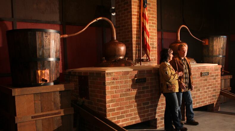 Joe and Melissa Duer -- founders of Indian Creek Distillery, which makes Staley Rye Whiskey using the same pot stills that Melissa Duer's family used in the early 19th century -- are now making hand sanitizer during the coronavirus pandemic. Staff file photo by Jim Witmer