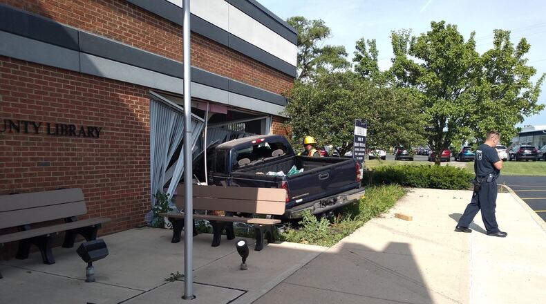 A pickup truck crashed into the Champaign County Library, 1060 Scioto St. in Urbana, on Wednesday night. Contributed by library staff member Gloria Malone.