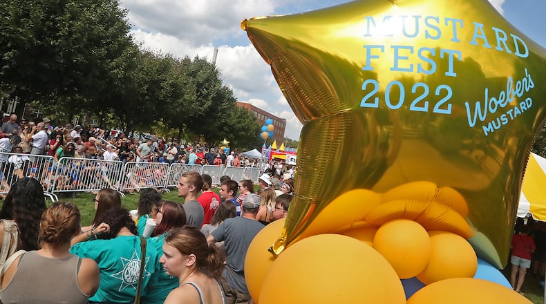 One of the highlights of MustardFEST is the Champion City Wiener Dog Races Saturday, Sept. 17, 2022 at National Road Commons Park in Springfield. BILL LACKEY/STAFF