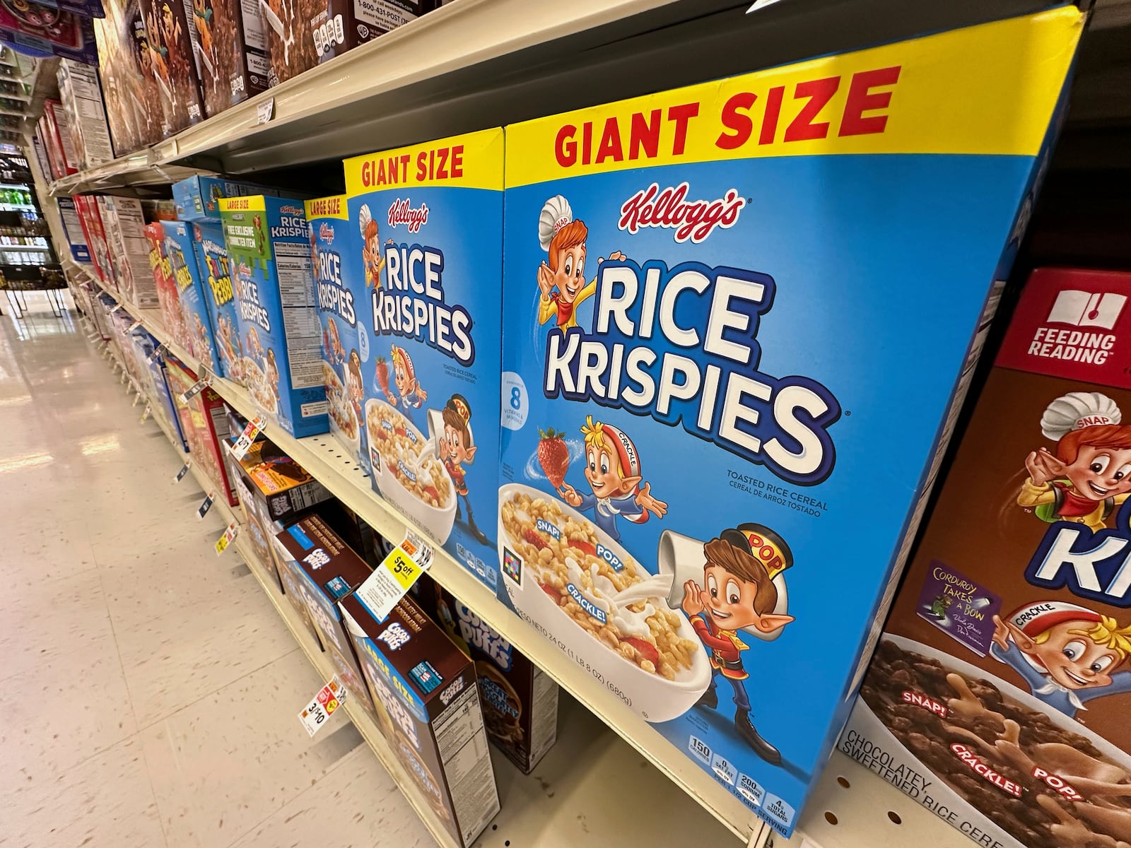 Boxes of Kellogg's breakfast cereal are seen at a super market, Friday, July 11, 2025, in Springfield, Pa. (AP Photo/Matt Slocum)