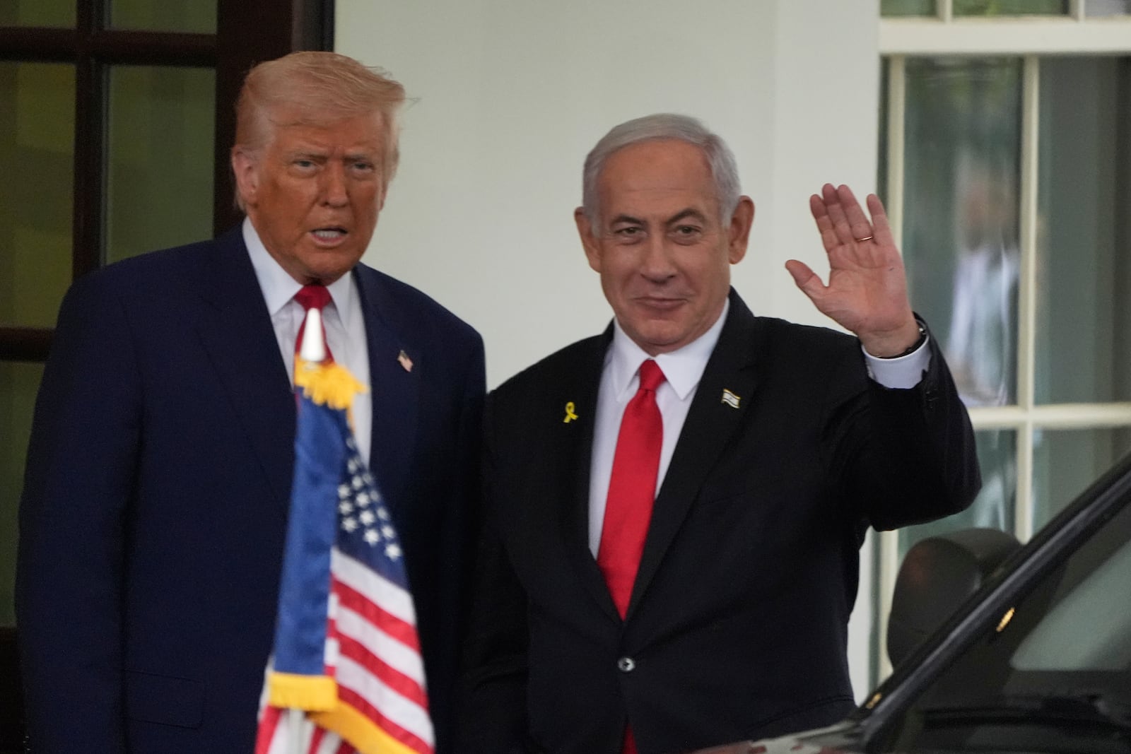 Israel's Prime Minister Benjamin Netanyahu is greeted by President Donald Trump as he arrives at the West Wing of the White House in Washington, Monday, April 7, 2025, in Washington. (AP Photo/Mark Schiefelbein)