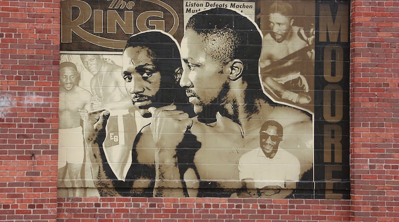 Mural of boxing champion Davey Moore on the side of Mother Stewart's Brewery. BILL LACKEY/STAFF