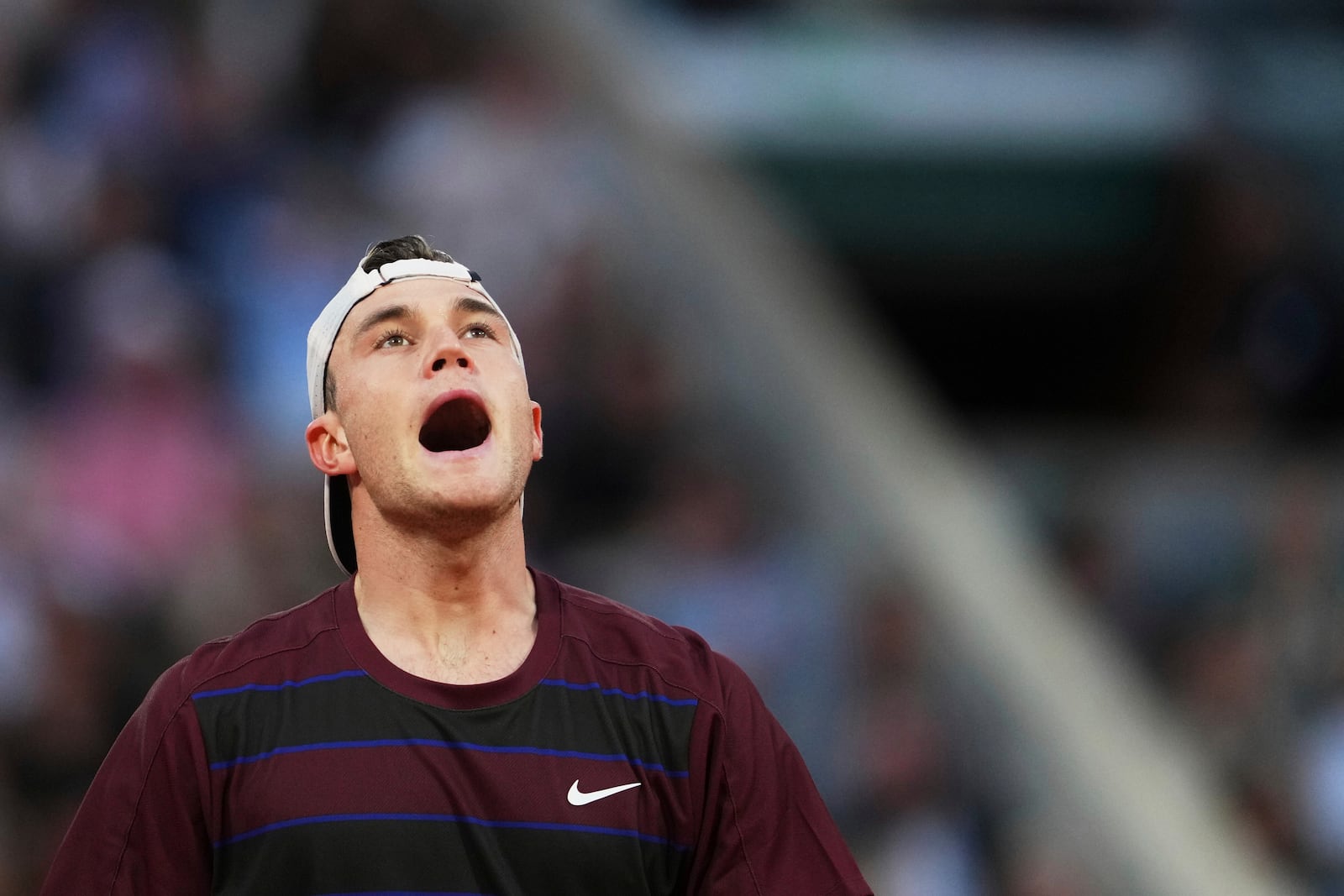 Britain's Jack Draper reacts during a second-round match against France's Gael Monfils during the French Tennis Open at the Roland-Garros stadium in Paris, Thursday, May 29, 2025. (AP Photo/Lindsey Wasson)