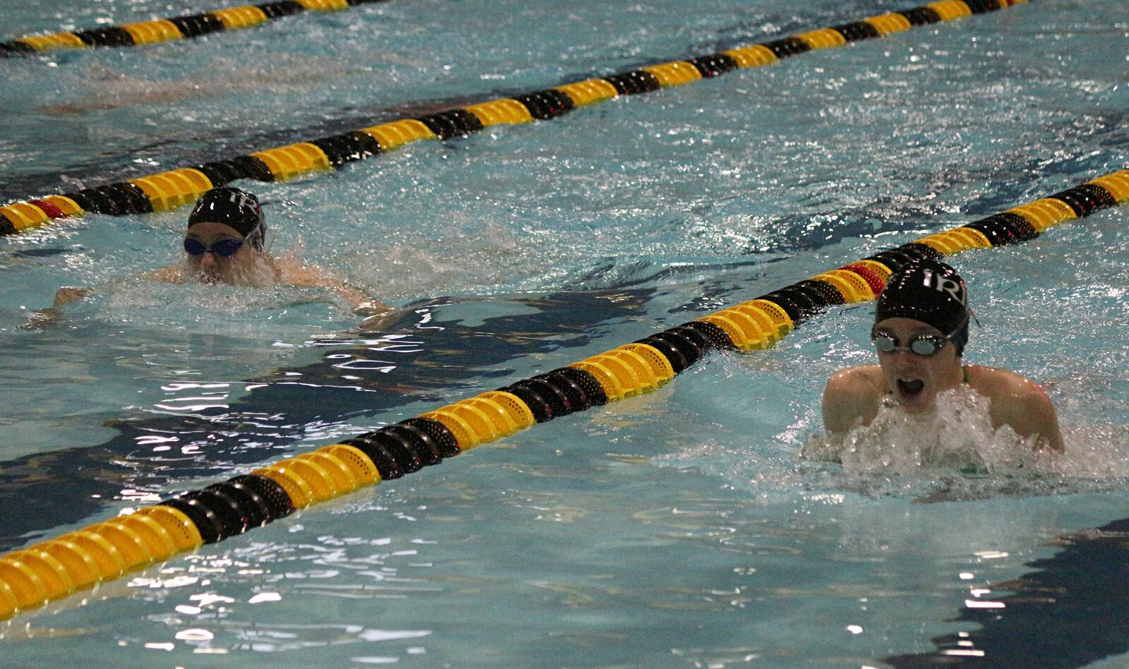 Catholic Central sophomores Bridget Engel (left) and Addie Engel (right) qualified for the Division II swimming and diving state championships in the 100-yard breaststroke in Canton. Greg Billing / Contributed