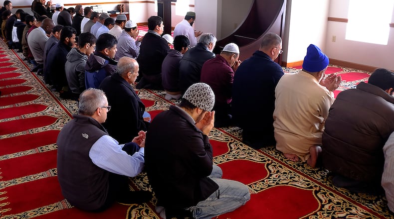 Members of Masjid Al-Madina in Springfield hold Friday prayers. The mosque is investing an additional $500,000 the center and continues to encourage people to attend Friday prayer. Bill Lackey/Staff