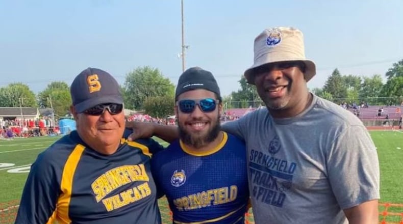 Springfield's Jayden McKinster and his coaches. Contributed photo