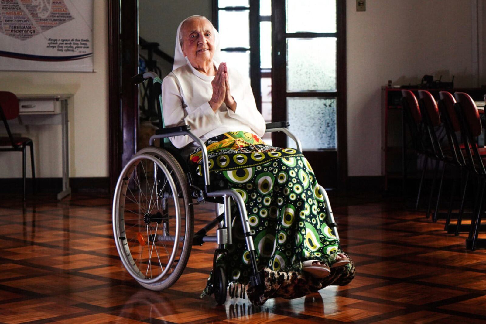 FILE - In this photo released by LongeviQuest, Sister Inah Canabarro, 115, puts her hands together in prayer in Porto Alegre, Brazil, Friday, Feb. 16, 2024. (Carlos Macedo/LongeviQuest, via AP)