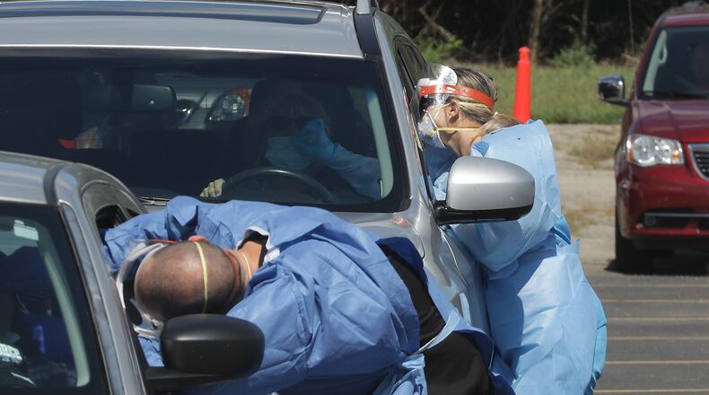 The Clark County Combined Health District in partnership with the Ohio Department of Health and Ohio National Guard held a free COVID-19 pop-up testing clinic Friday at the Life in Christ Community Church. BILL LACKEY/STAFF