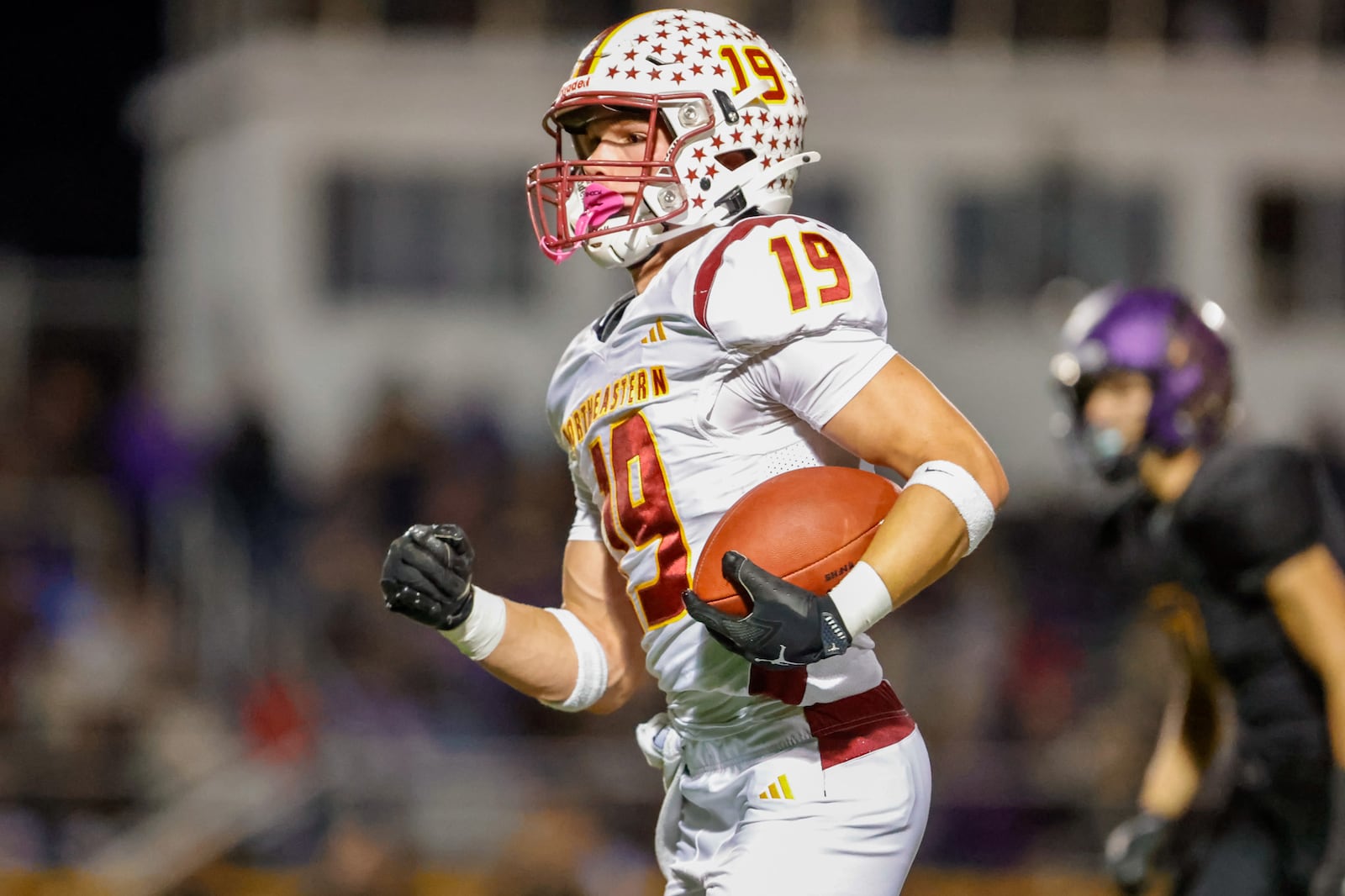 Northeastern High School senior Jacoby Newman runs for a touchdown during their game against on Friday, Oct. 17 at Indian Stadium. The Jets won 52-36. MICHAEL COOPER / STAFF