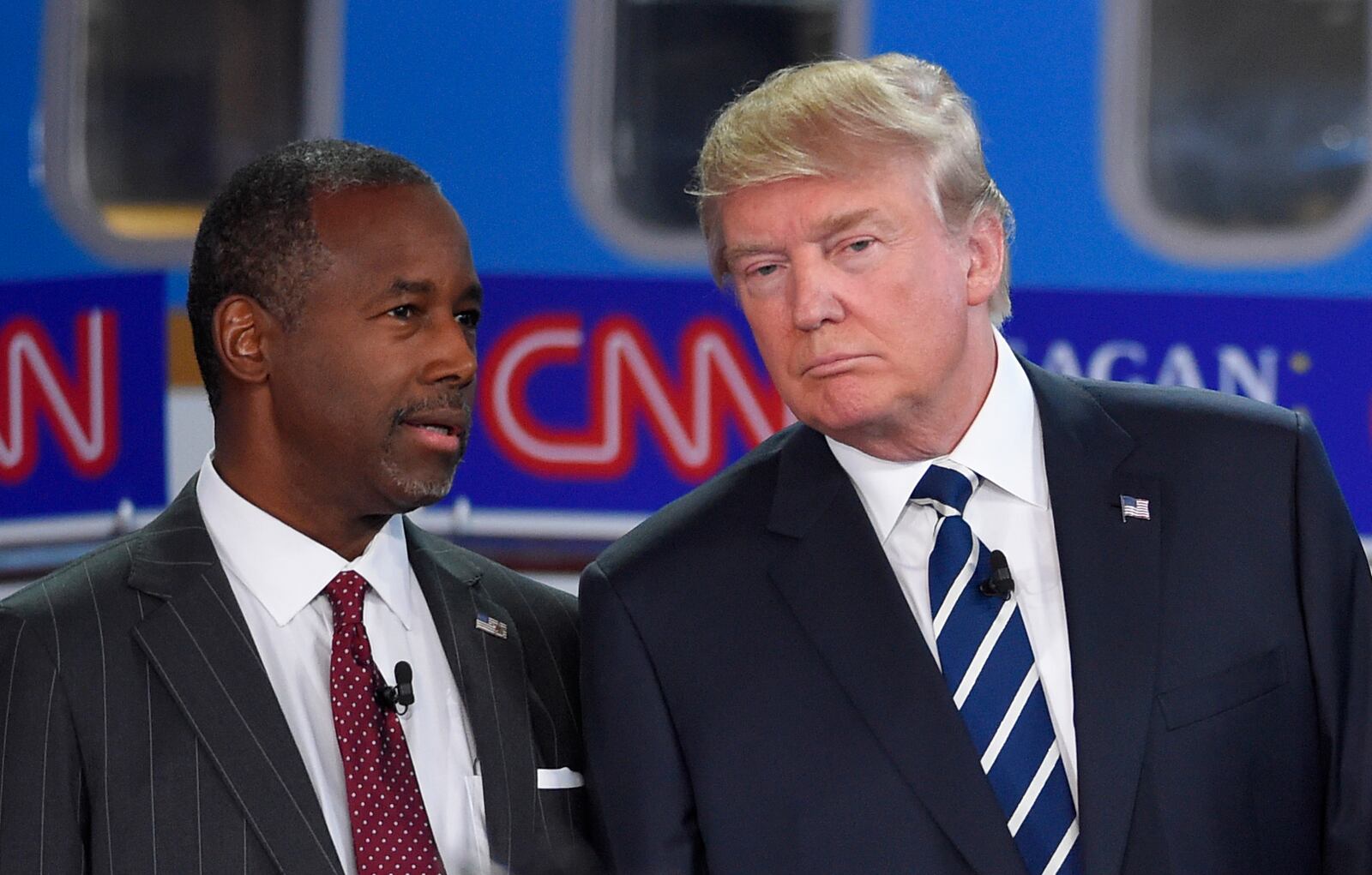 Republican presidential candidates Ben Carson, left, and Donald Trump talk before the start of the CNN Republican presidential debate at the Ronald Reagan Presidential Library and Museum on Wednesday, Sept. 16, 2015, in Simi Valley, Calif. (AP Photo/Mark J. Terrill)