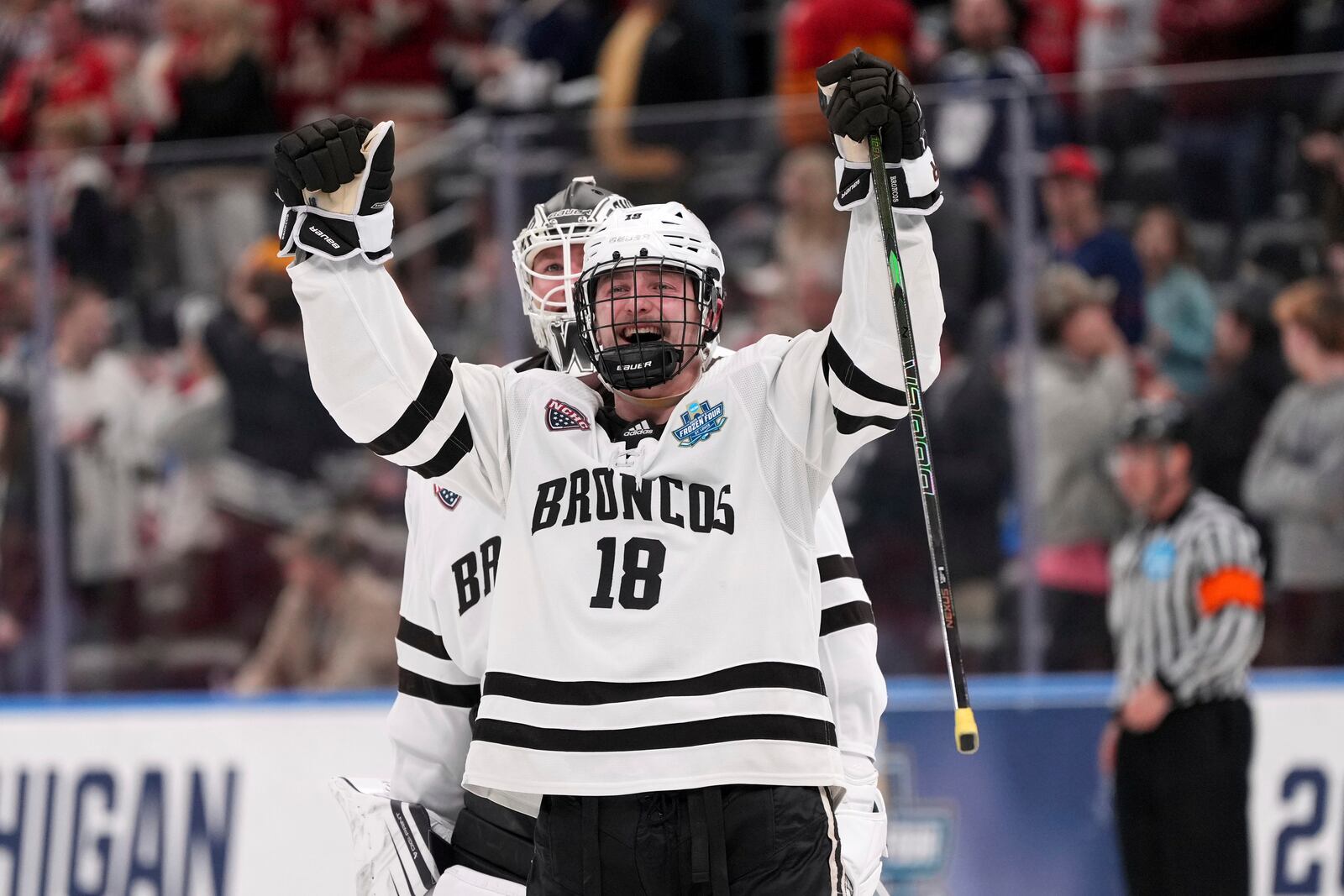 Western Michigan's Wyatt Schingoethe (18) celebrates a double overtime victory over Denver in a semifinal game in the NCAA Frozen Four men's college hockey tournament, Thursday, April 10, 2025, in St. Louis (AP Photo/Jeff Roberson)