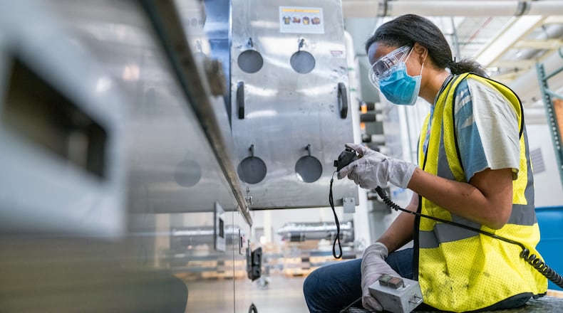 Lauren Poellnitz, a process engineer at Silfex, works inside the company's facility in Springfield that is on Titus Road. That location now boast a workforce of over 500 people, surpassing original growth expectations. Mark Schmitter, Contributed.