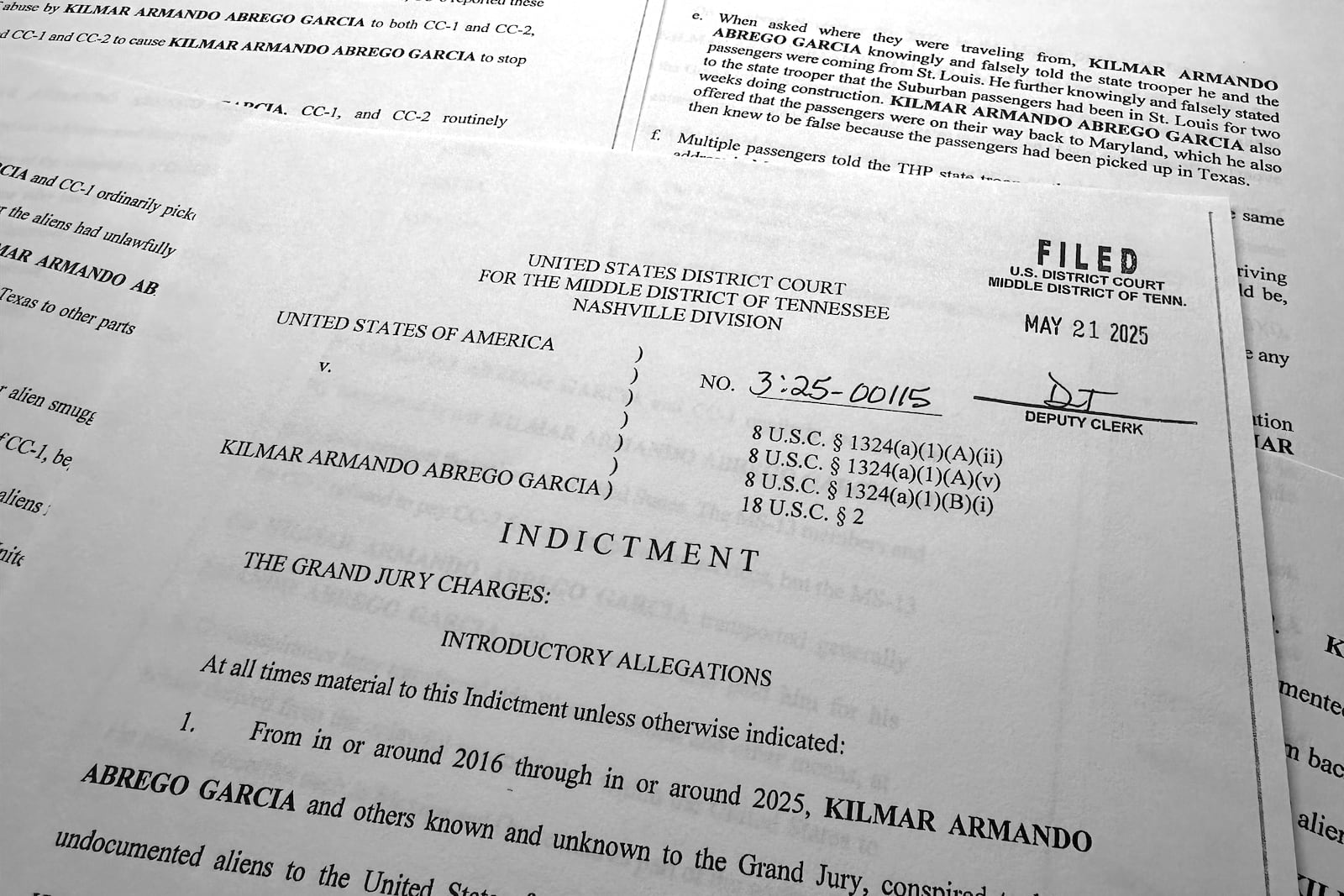 The indictment of Kilmar Abrego Garcia that charges him with transporting people who were in the United States illegally, is photographed, Friday, June 6, 2025, in Washington. (AP Photo/Jon Elswick)