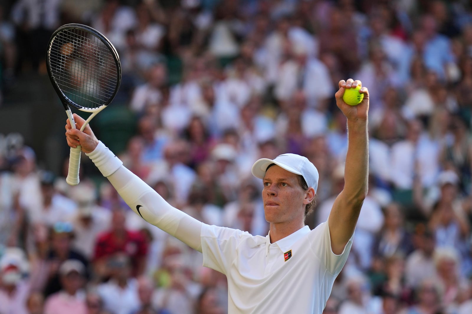 Italy's Jannik Sinner celebrates after beating Serbia's Novak Djokovic in a men's singles semifinal at the Wimbledon Tennis Championships in London, Friday, July 11, 2025. (AP Photo/Kin Cheung)