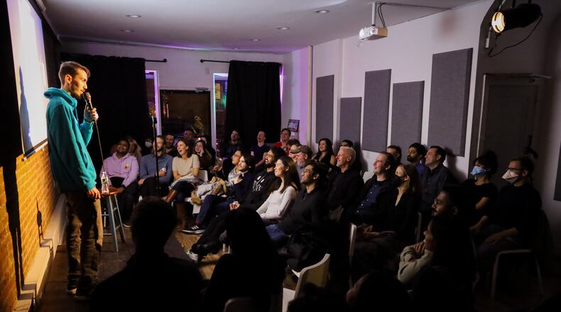 Ben Miller performing in front of audience