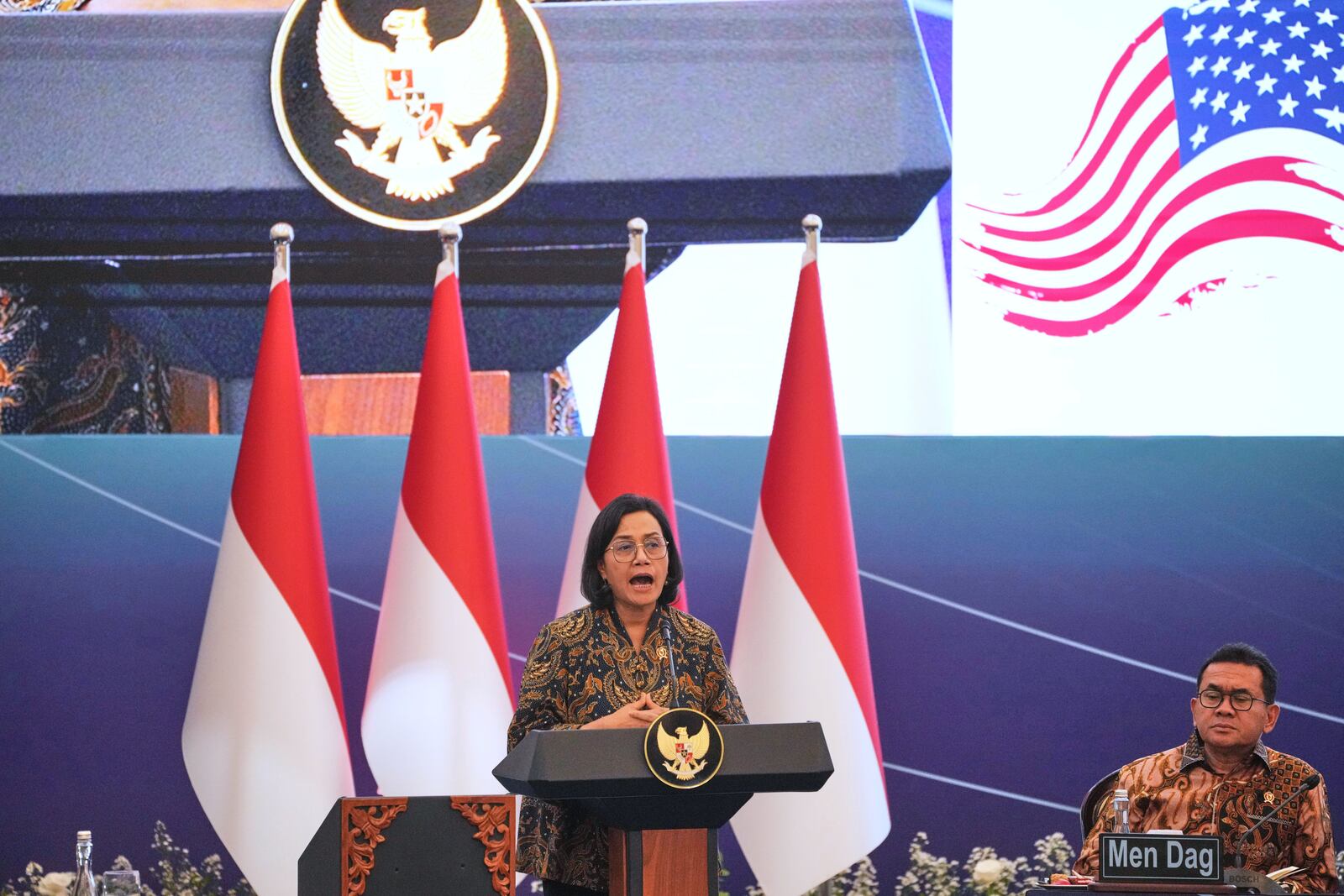 Indonesian Finance Minister Sri Mulyani Indrawati delivers a speech during an event called Economic Gathering with the President of the Republic of Indonesia, in Jakarta, Indonesia, Tuesday, April 8, 2025. (AP Photo/Dita Alangkara)