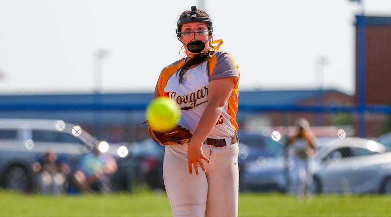Cutline: Kenton Ridge High School junior Kylie Ropp throws a pitch during their Division II district final game against Clinton-Massie on Friday evening at Miami East High School. The Cougars won 5-3 to win their first district title since 2018. CONTRIBUTED PHOTO BY MICHAEL COOPER