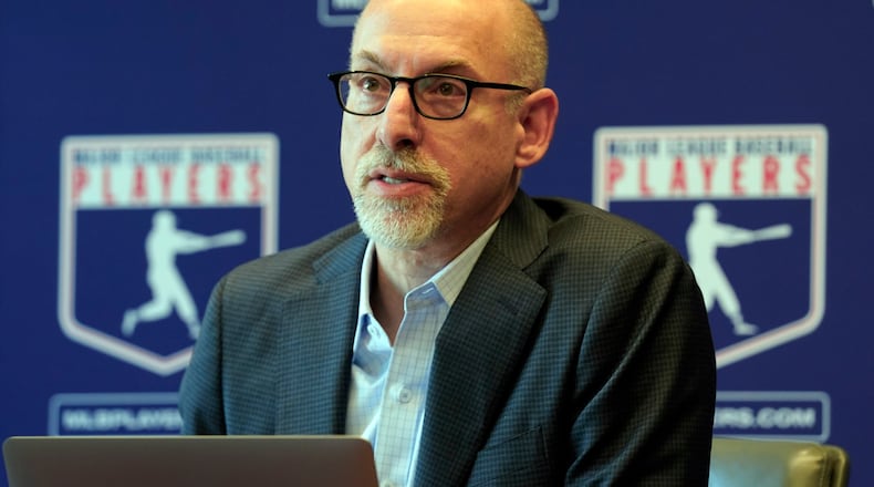 FILE - Major League Baseball Players Association Senior Director, Collective Bargaining & Legal, Bruce Meyer answers a question at a news conference in their offices in New York, March 11, 2022. (AP Photo/Richard Drew, File)