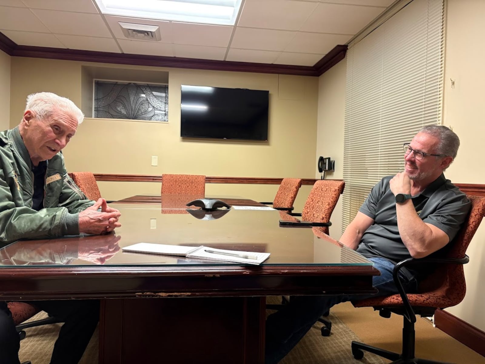 Sharing memories: Father and son, both named Joe Adamo, recalling a life well lived. THOMAS GNAU/STAFF