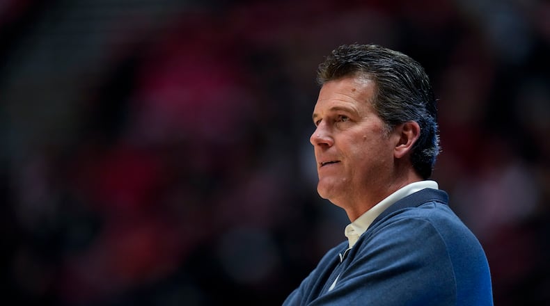 Nevada head coach Steve Alford looks on during the first half of an NCAA college basketball game against San Diego State, Tuesday, Jan. 10, 2023, in San Diego. (AP Photo/Gregory Bull)