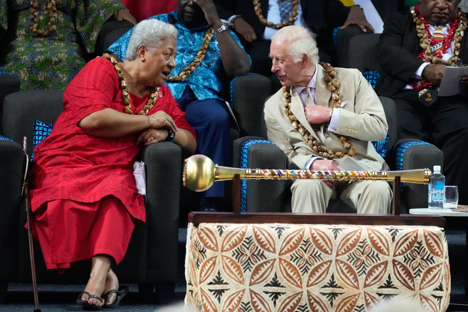 Britain's King Charles, right, and Samoan Prime Minister Afioga Fiamē Naomi Mataʻafa, left, talk during the opening ceremony for the Commonwealth Heads of Government meeting in Apia, Samoa, Oct. 25, 2024. (AP Photo/Rick Rycroft, Pool, File)