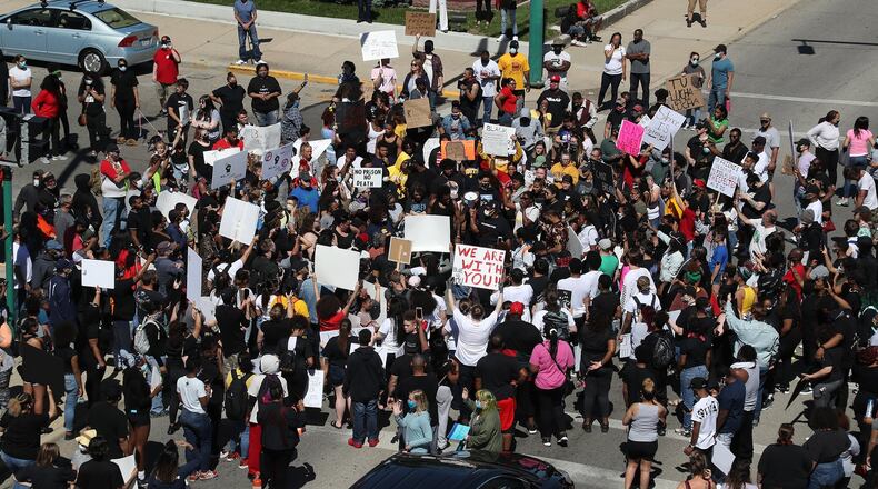 Hundreds of demonstrators marched through the streets of Springfield in the end of May to protest racial injustices occurring in the country. BILL LACKEY/STAFF