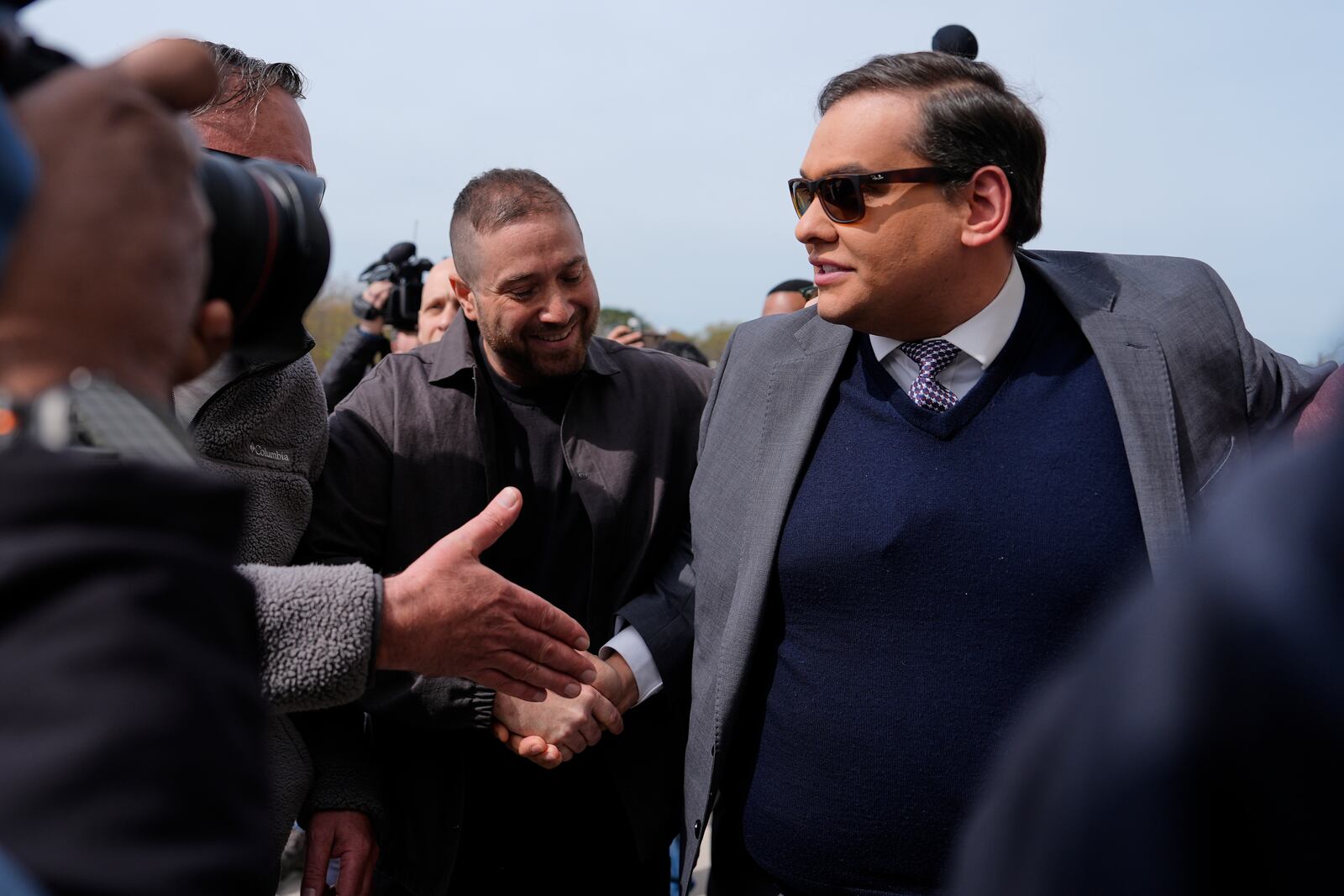 Former U.S. Rep. George Santos arrives at federal court for sentencing, Friday, April 25, 2025, in Central Islip, N.Y. (AP Photo/Julia Demaree Nikhinson)