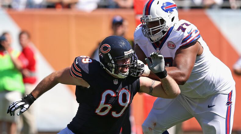 CHICAGO, IL - SEPTEMBER 07: Cordy Glenn #77 of the Buffalo Bills blocks Jared Allen #69 of the Chicago Bears at Soldier Field on September 7, 2014 in Chicago, Illinois. The Bills defeated the Bears 23-20 in overtime. (Photo by Jonathan Daniel/Getty Images)