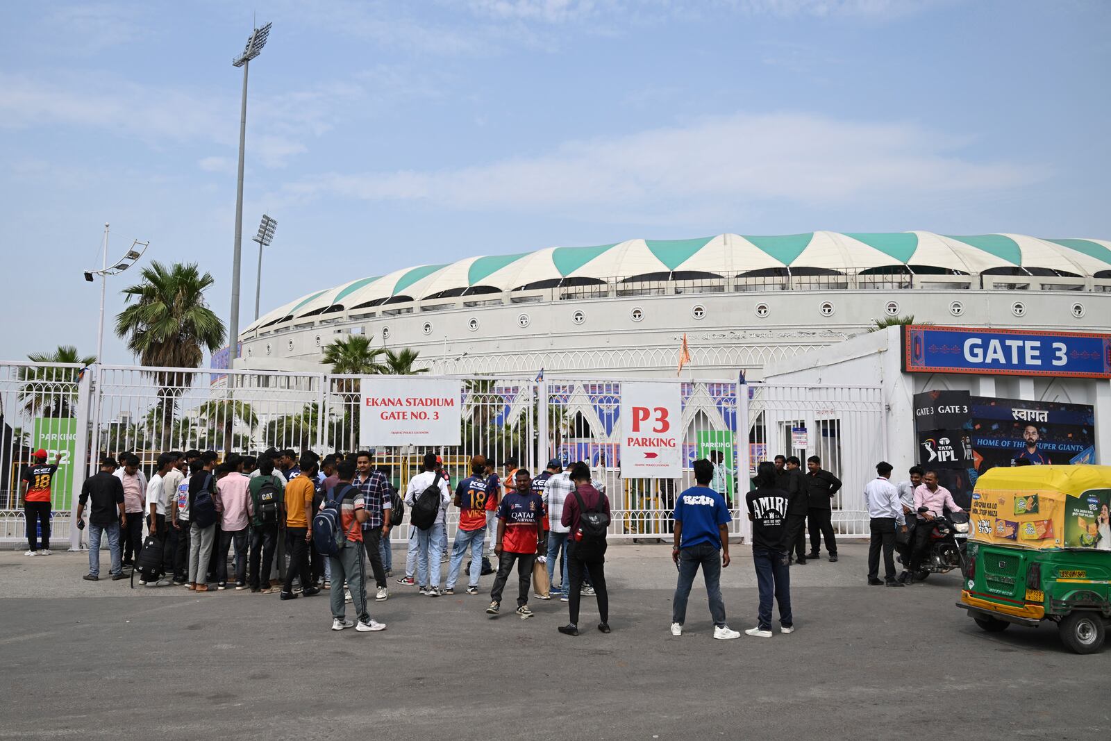 Fans gather outside Atal Bihari Vajpayee Ekana Cricket Stadium after organizers suspended the Indian Premier League for one week following the escalating military tensions with Pakistan, in Lucknow, India, Friday, May 9, 2025. (AP Photo)