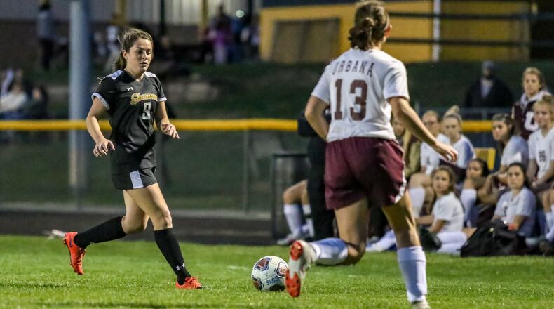 Shawnee High School senior Nyellah Raiff plays a ball down the sideline during their game against Urbana on Oct. 9. Michael Cooper/CONTRIBUTED
