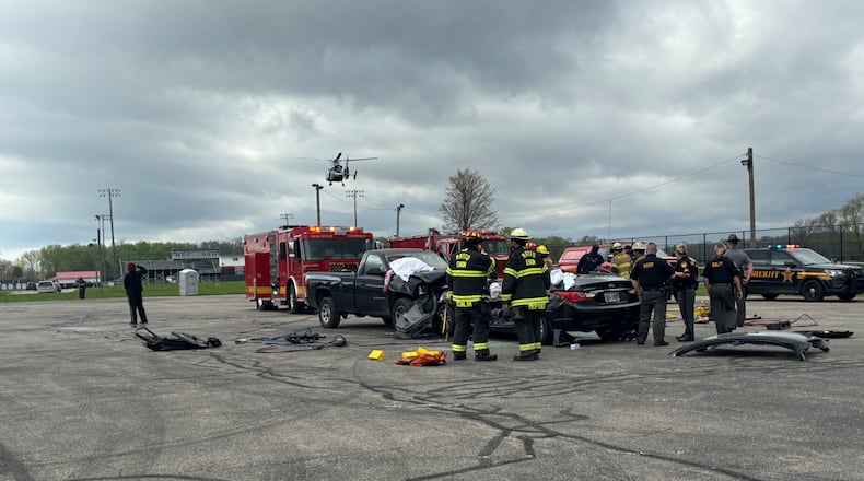 Greenon Local Schools hosted it’s mock crash event for junior and senior students on Thursday, April 17. The staged crash was complete with student actors and local emergency response teams for students to learn the consequences of impaired and distracted driving and the importance of making responsible daily driving choices, especially during celebratory events like prom night. The simulation event included Greenon, Clark County Sheriff’s Office, Enon-Mad River Fire and EMS, Hustead Fire and EMS, the Ohio State Highway Patrol, Premier Health Care Flight, Dan’s Towing and Recovery and Adkins Funeral Home. After the simulated crash, Greenon held an afternoon session for students with follow-up guest speakers, including speakers from Mothers Against Drunk Driving (MADD) and Tracy Locakhart-Williams from the Clark County Prosecutors Office to make sure that the message resonates beyond the initial shock of the simulation. Contributed