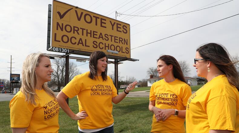 Northeastern Local Schools supporters, from left, Brittany Thompson, Michelle Haythe, Chrisdee Rastatter, Amanda Foulk discuss plans to get the word out about the Northeastern levy Friday, April 16, 2018. BILL LACKEY/STAFF