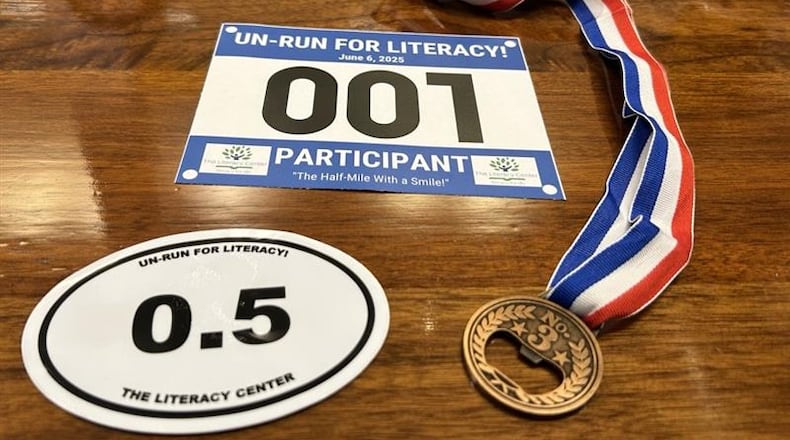Participants of the inaugural Un-Run for Literacy will receive a runner's bib, sticker, medal/bottle opener and a free beer. JESSICA OROZCO/STAFF