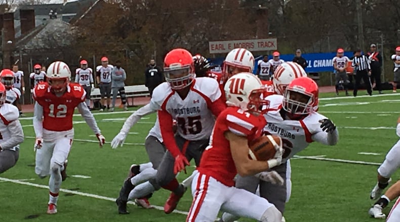 Wittenberg’s Sam Kayser returns a kickoff Saturday in the Tigers’ first round NCAA Dividion III playoff game against Frostburg State. BRETT TURNER / CONTRIBUTED