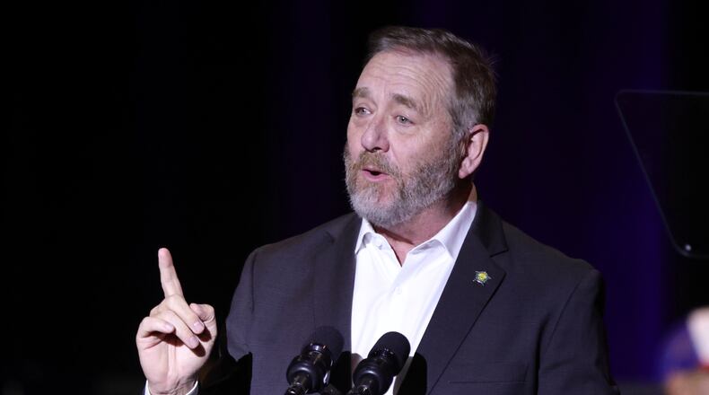 FILE - Ohio Attorney General Dave Yost speaks during a rally for Republican vice presidential candidate Sen. JD Vance, R-Ohio, in Middletown, Ohio, Monday, July 22, 2024. According to campaign finance reports filed Wednesday, July 31, Yost has already saved up $1.5 million toward a bid for governor that’s more than two years off. (AP Photo/Paul Vernon, File)