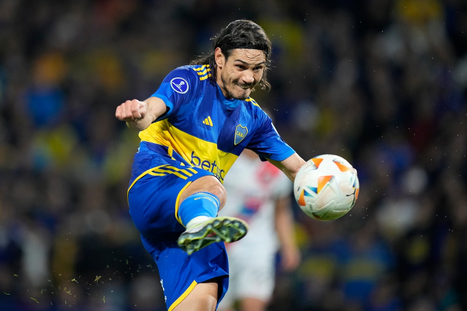 FILE - Edinson Cavani of Argentina's Boca Juniors strikes the ball during a Copa Sudamericana Group D soccer match against Bolivia's Nacional Potosi at La Bombonera stadium in Buenos Aires, Argentina, Wednesday, May 29, 2024. (AP Photo/Natacha Pisarenko, File(