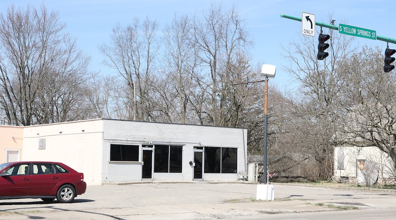 Three juveniles were shot Saturday in front of 1935 South Yellow Springs Street. BILL LACKEY/STAFF