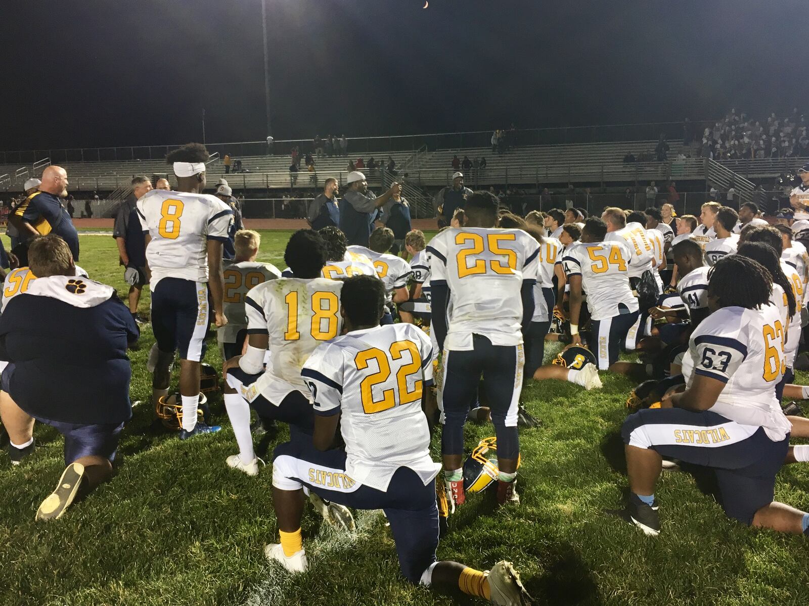 The Springfield Wildcats listen to coach Maurice Douglass after their 55-21 rout of Lancaster in Week 1 of the 2017 high school football season. MARCUS HARTMAN/STAFF