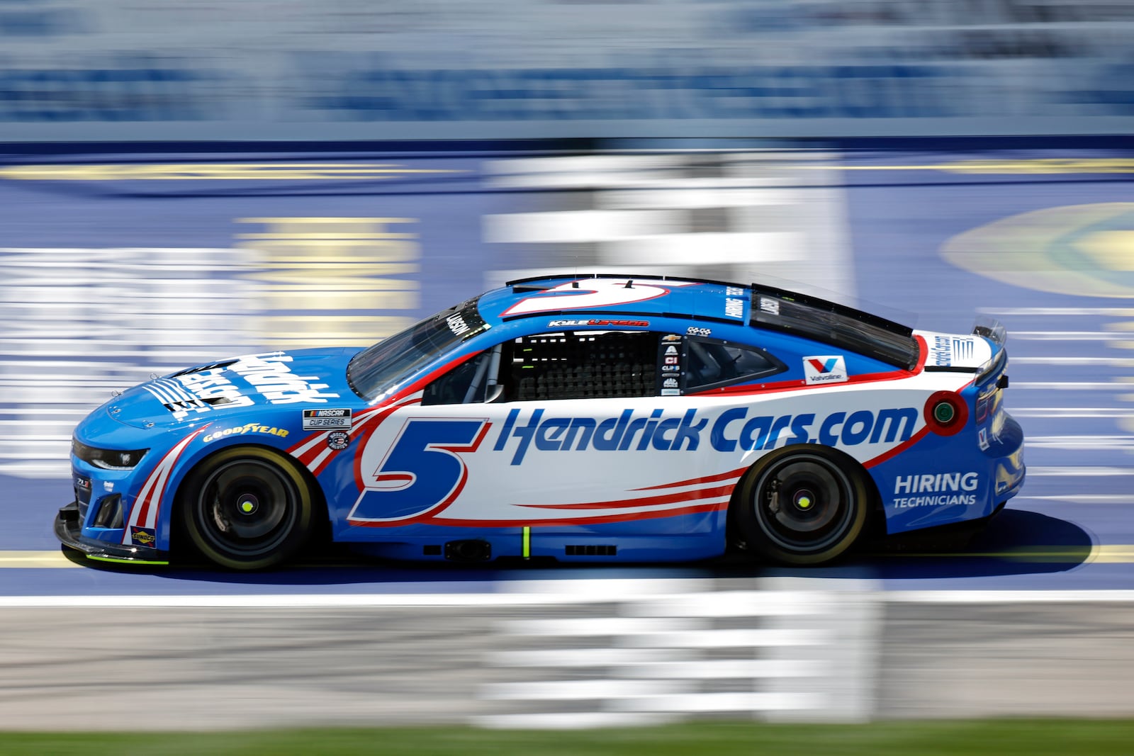 Kyle Larson crosses the start/finish line during the first stage of a NASCAR Cup Series auto race at Kansas Speedway in Kansas City, Kan., Sunday, May 11, 2025. (AP Photo/Colin E. Braley)
