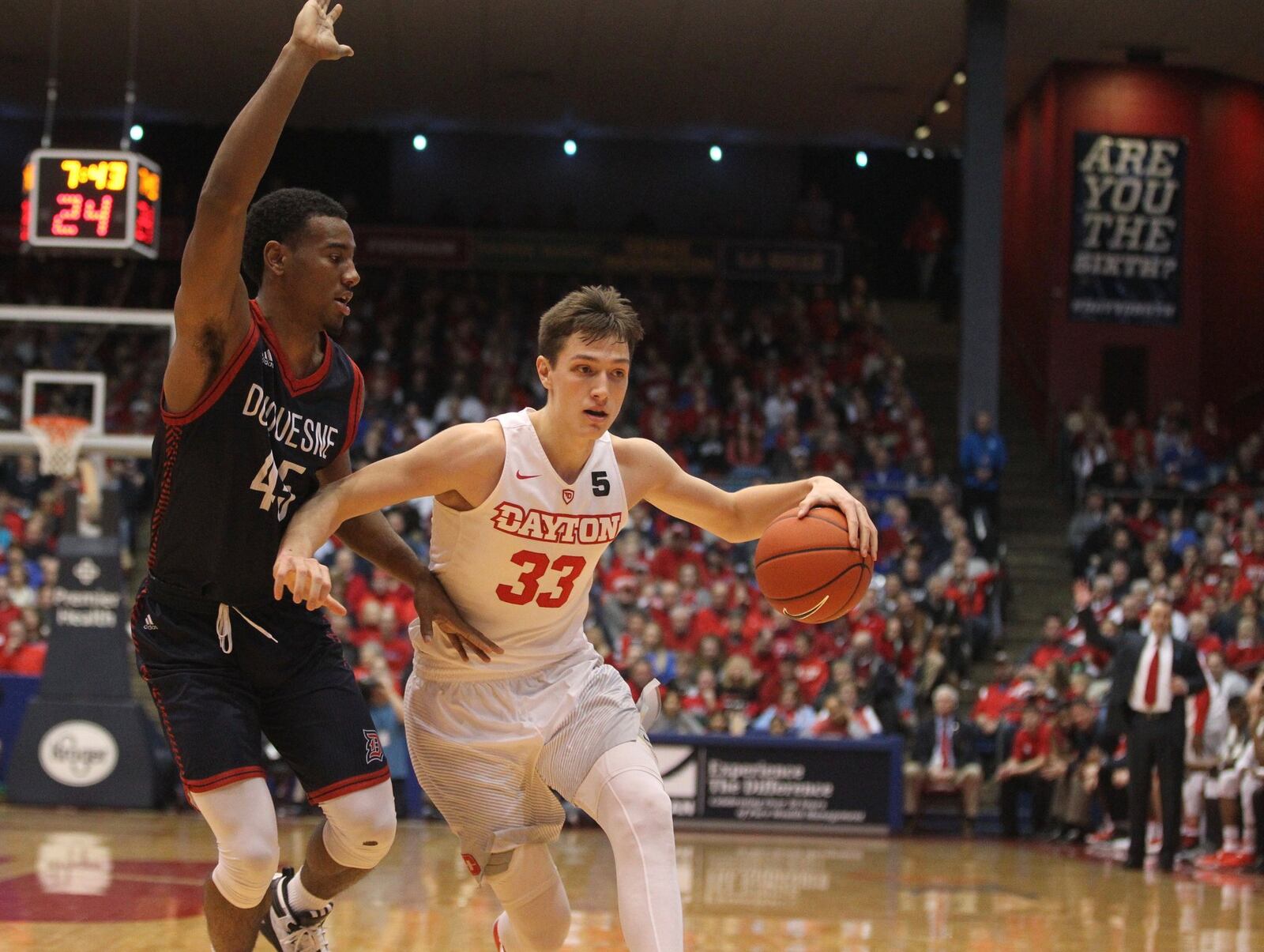 Dayton’s Ryan Mikesell drives to the basket against Duquesne on Saturday, Feb. 4, 2017, at UD Arena. David Jablonski/Staff